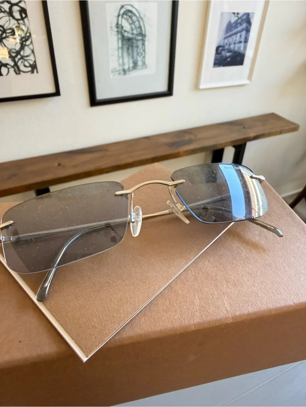 Swarovski Silver Rimless Sunglasses with Gray Lenses